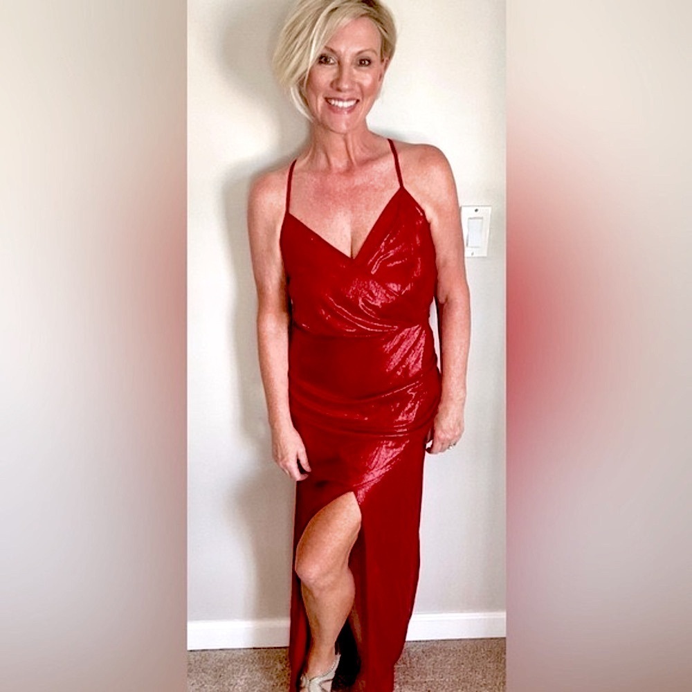 Red metallic floor length gown.